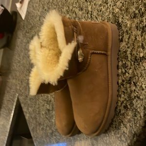 UGGs worn once.. they have some watermarks on them, but basically brand new